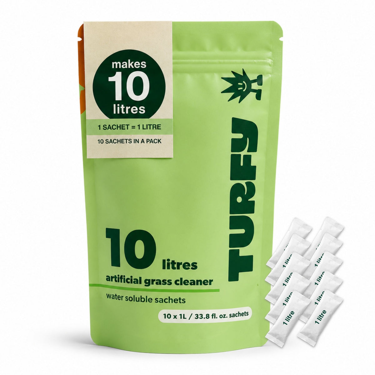 A green stand-up pouch of TURFY artificial grass cleaner, labeled as making 10 litres, with several small white sachets placed beside it on a white background.